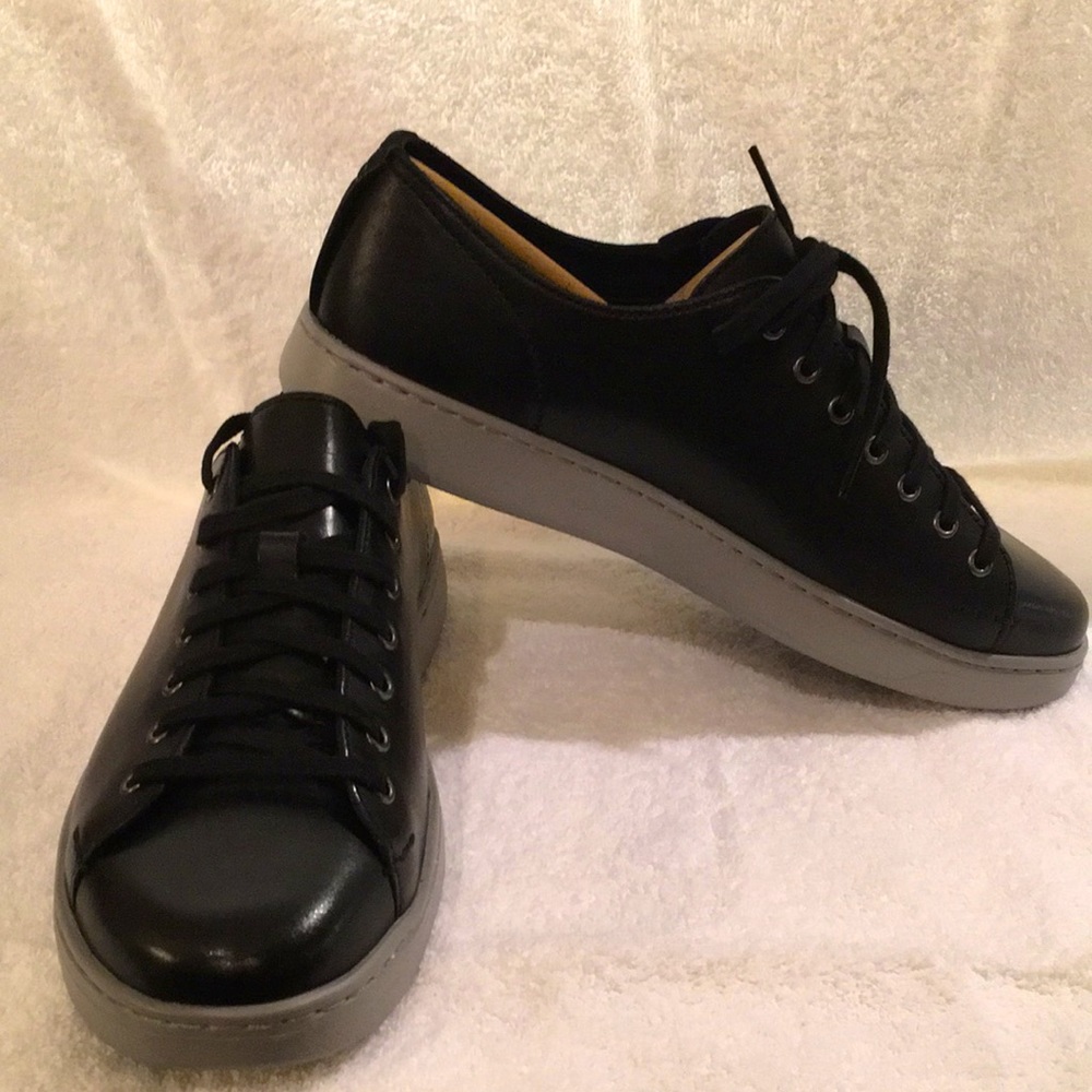 UGG Black Pismo Sneaker with grey sole. NIB never worn. Size 8.5 USA.
